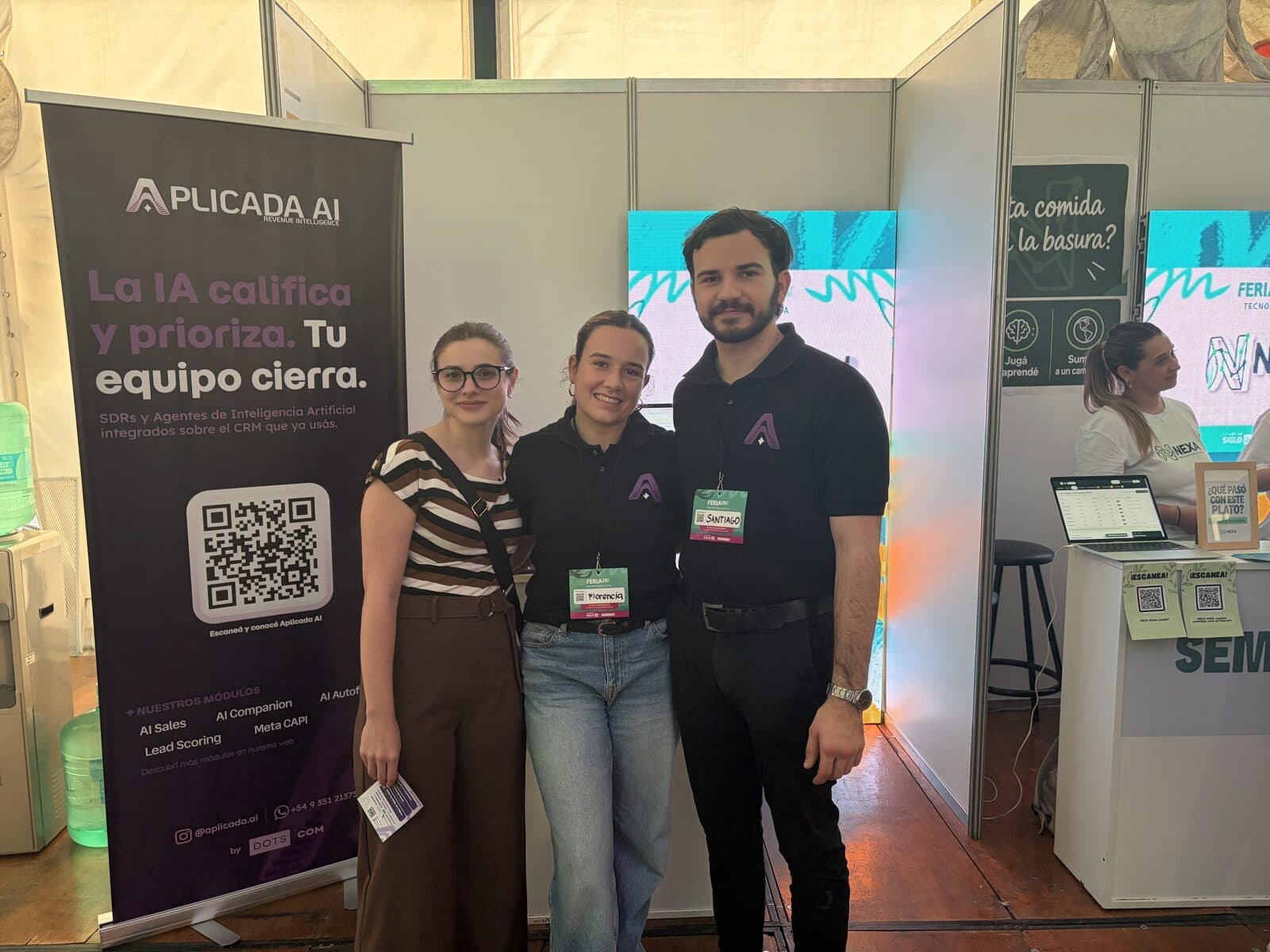 The Aplicada AI team at the Feria 21 stand