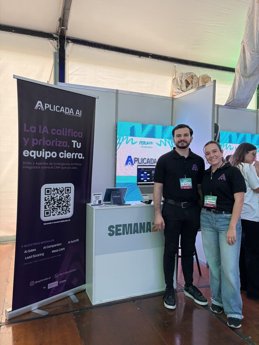 Team members at the Aplicada AI stand